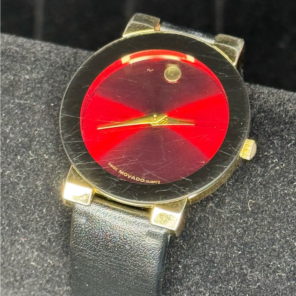 Movado Swiss Quartz Stainless Steel Base Gold Tone Black Band Watch